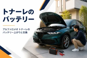 駐車場でSUVのバッテリーを点検している様子
